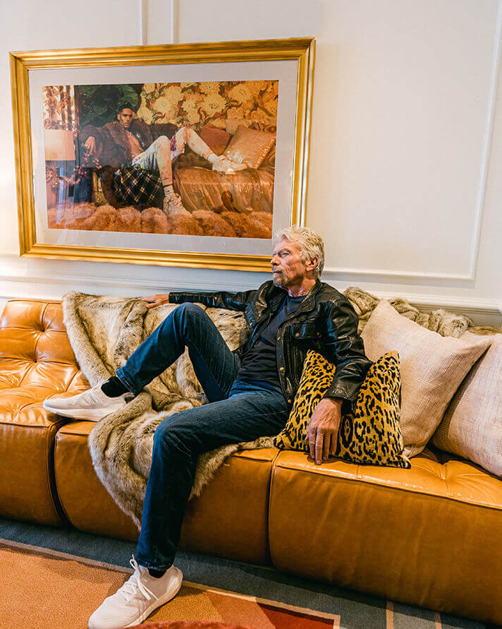 Richard Branson sitting on a couch