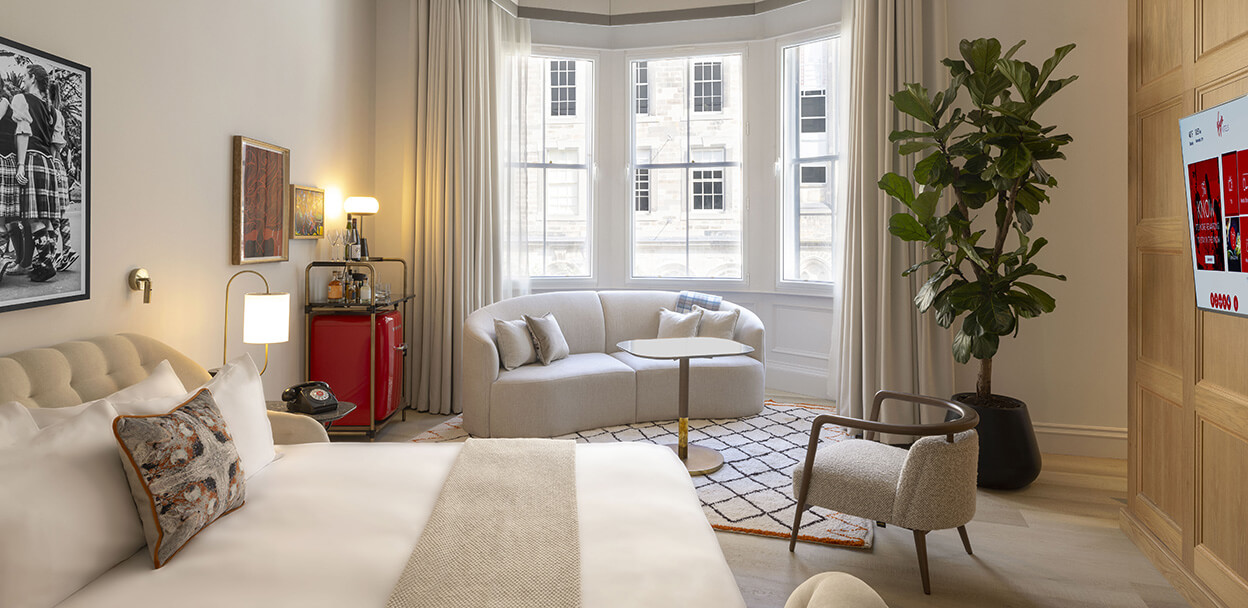 Virgin Hotels room looking at the bed