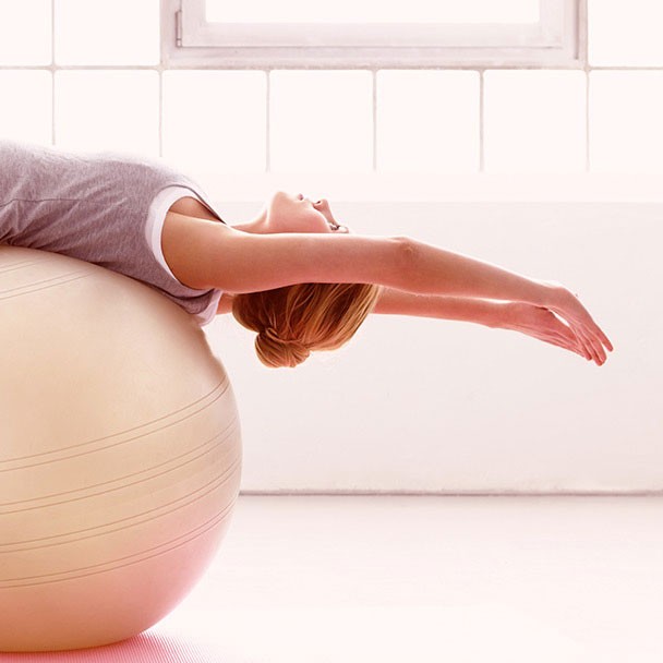woman on a medicine ball training