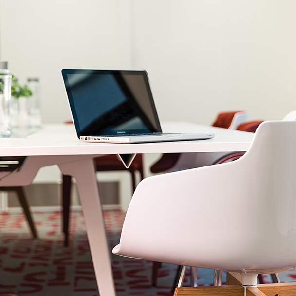 A laptop computer sitting on a table