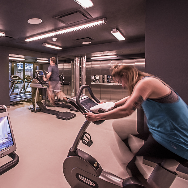 Image of people on fitness equipment at Virgin Hotels