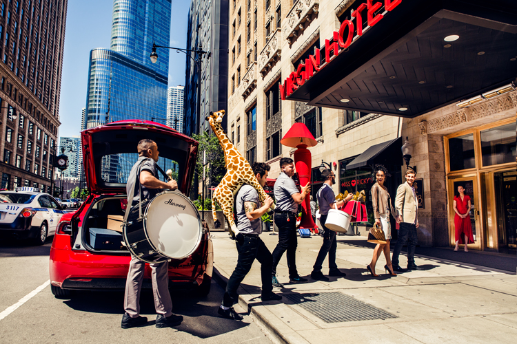 Valet helping unload the car at Virgin Hotels Chicago